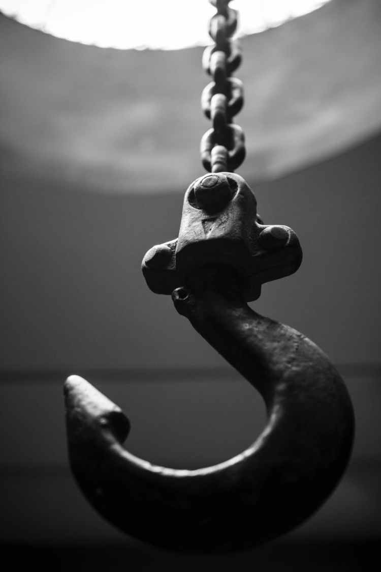 grayscale photograph of a hook hitch